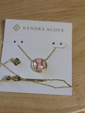 Kendra Scott Gold Necklace with White Pendant and Red Stitching